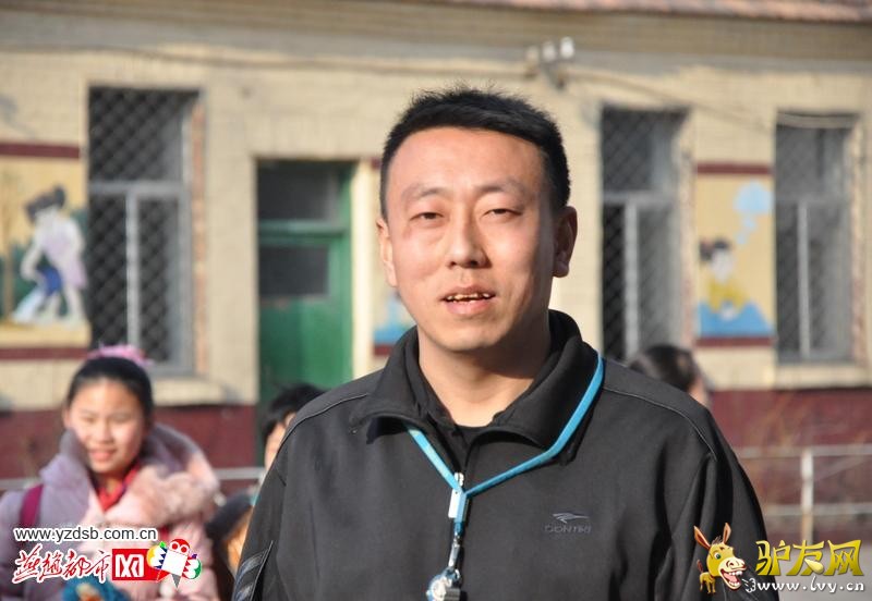 快乐的体育老师王韬。李家伟摄