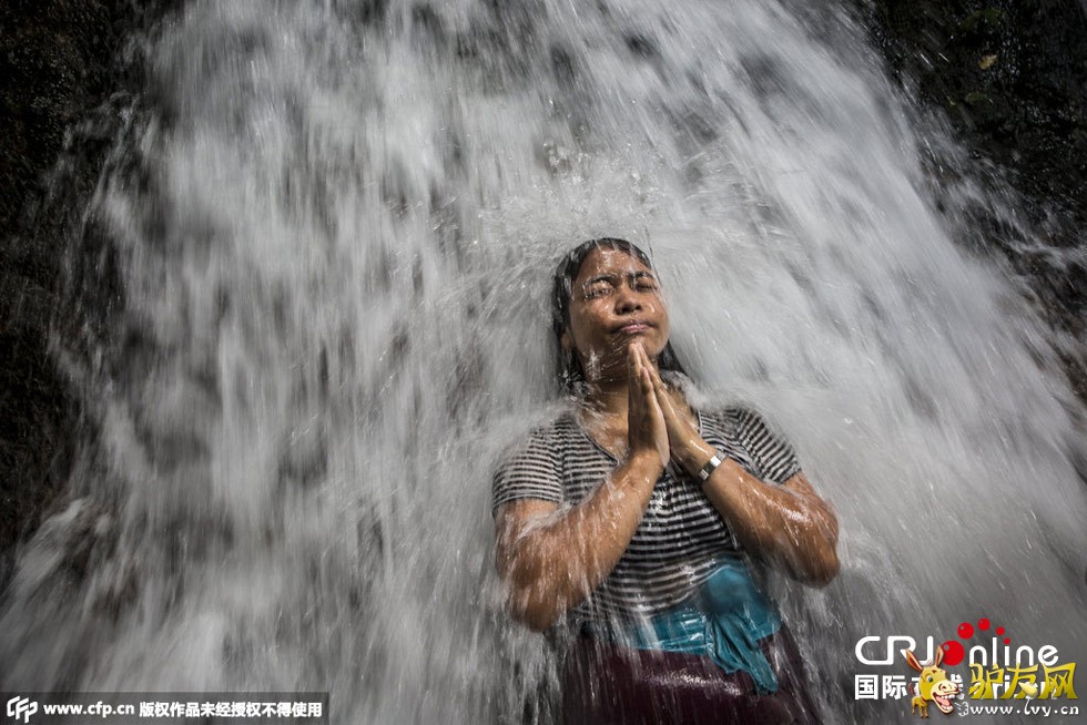 ʱ2014105գӡ嵺ӡȽͽٲ½ϴϴѷģ顣ͼƬԴ:Agung meswara/Getty Images/CFP